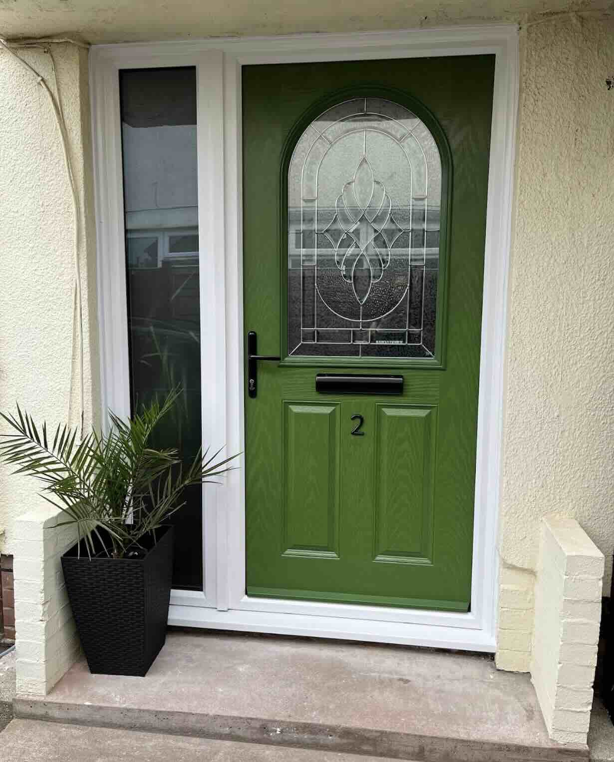 2 Panel 1 Arch Composite Front Door in Fern Green