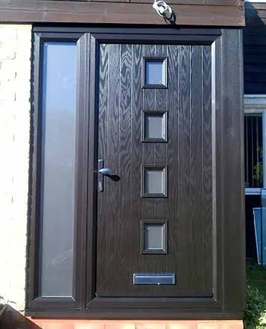 modern grey front door with grey frame