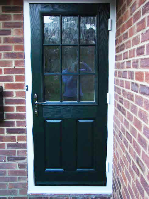 2 Panel 1 Grill Composite Front Door in Green