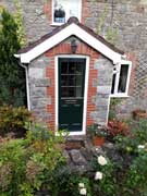 green cottage style composite door