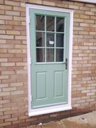 composite back door in chartwell green