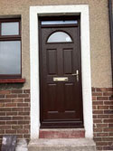 brown composite door with top box
